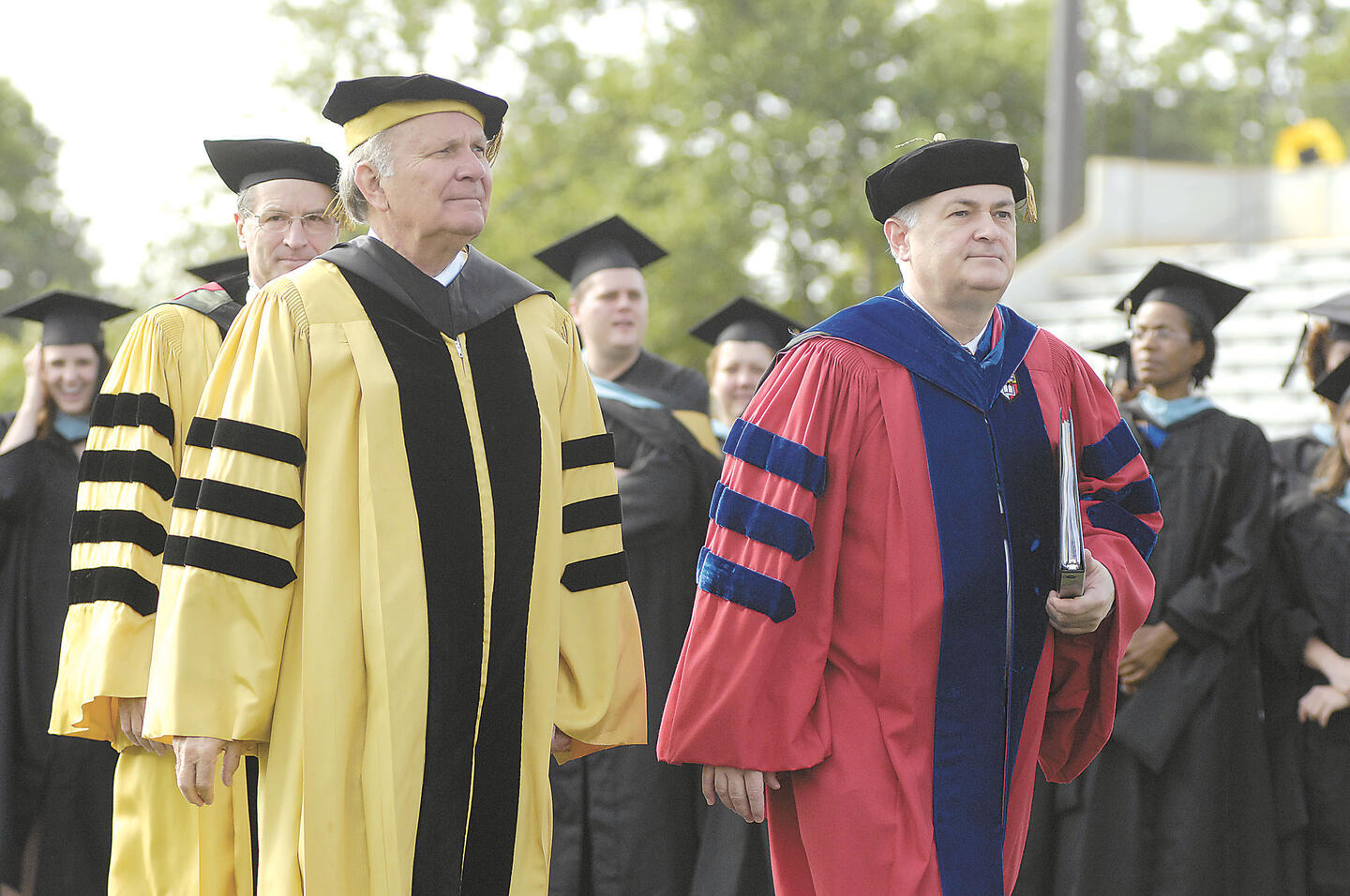 Chip Mason, left, and then Provost Steven Knapp, at Commencement in May 2007