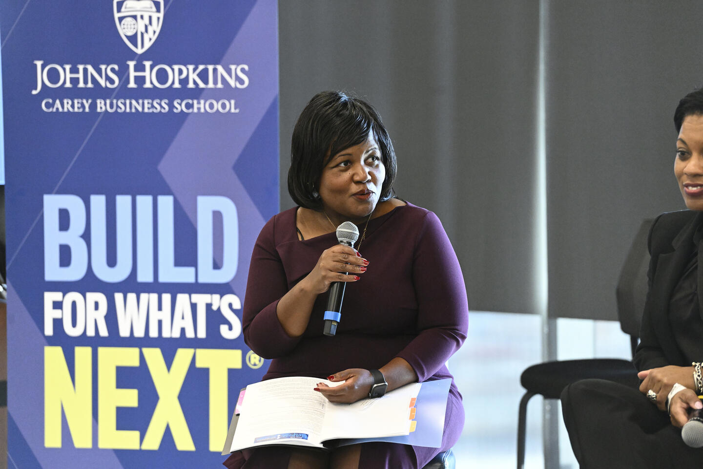 Alicia Wilson speaking at the Pivot with Purpose event