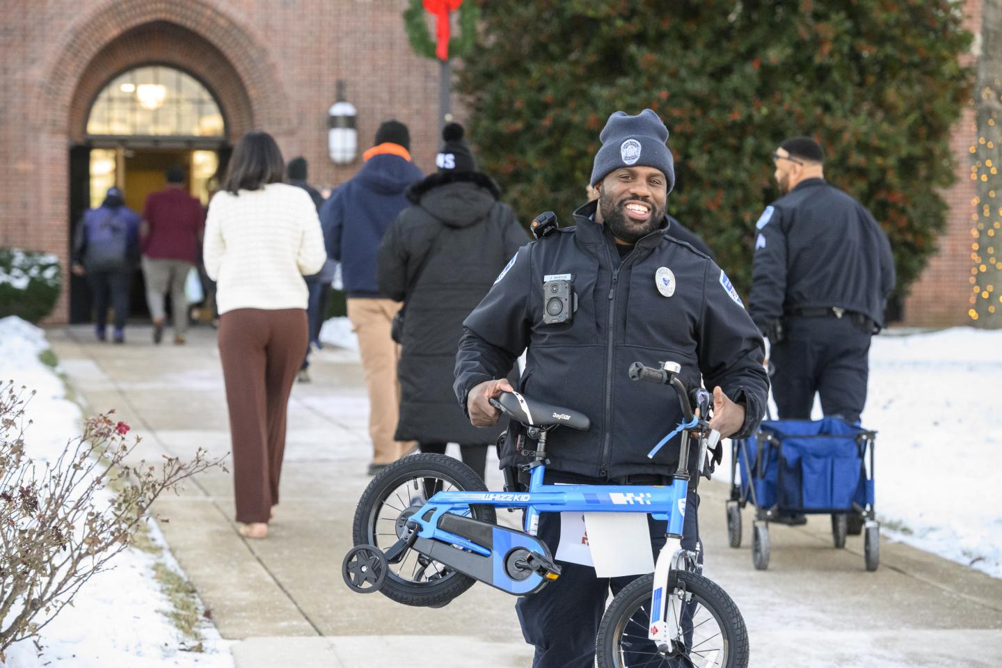 A Johns Hopkins affiliate carries a bicycle
