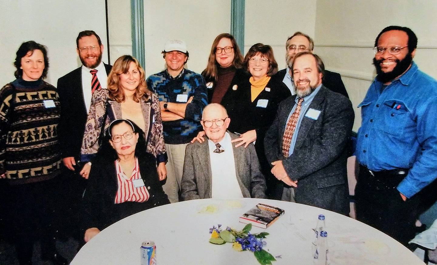 A group of people stand beside Chester Wickwire