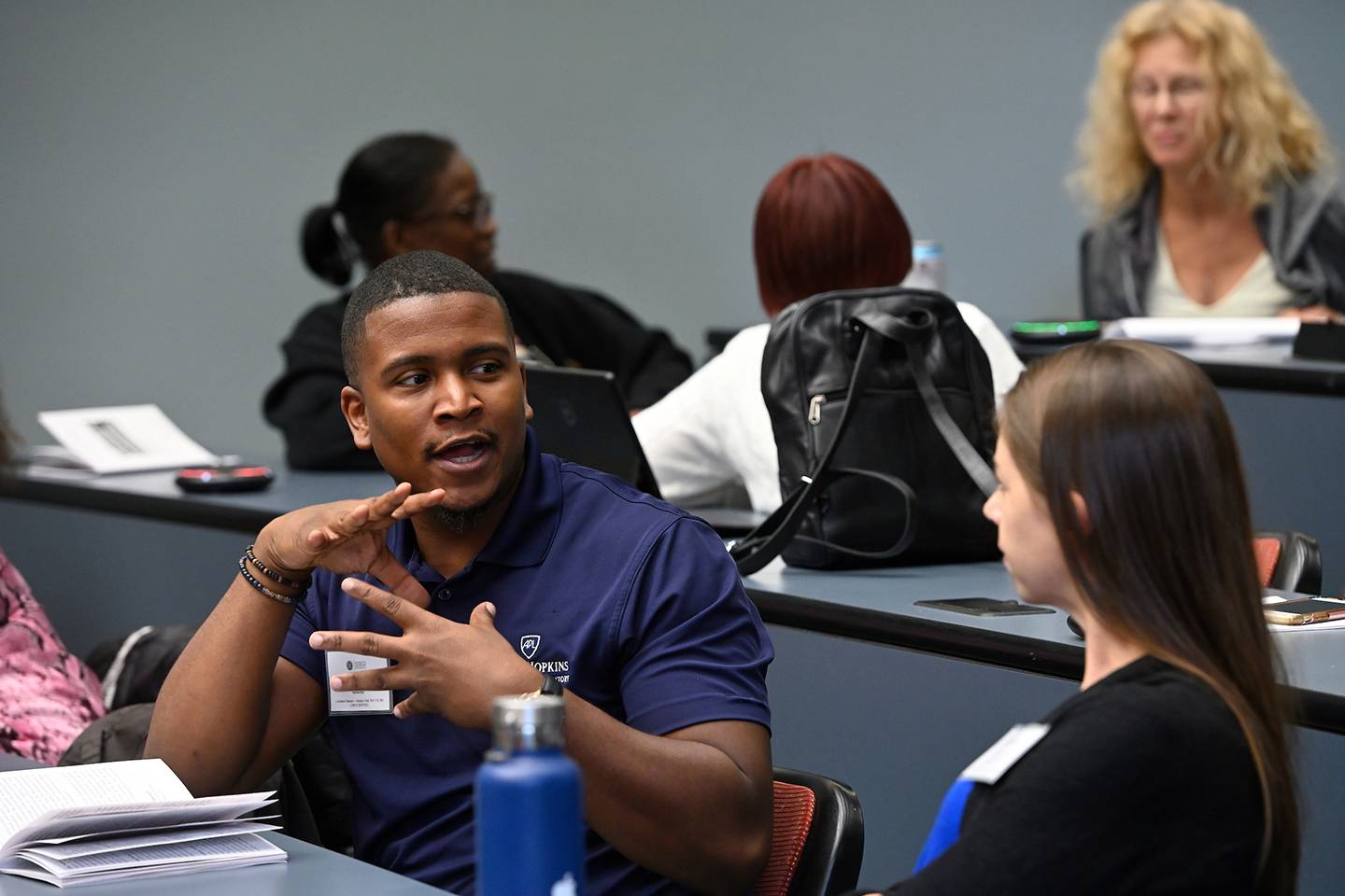 Workshop participants discuss during Diversity and Inclusion Conference