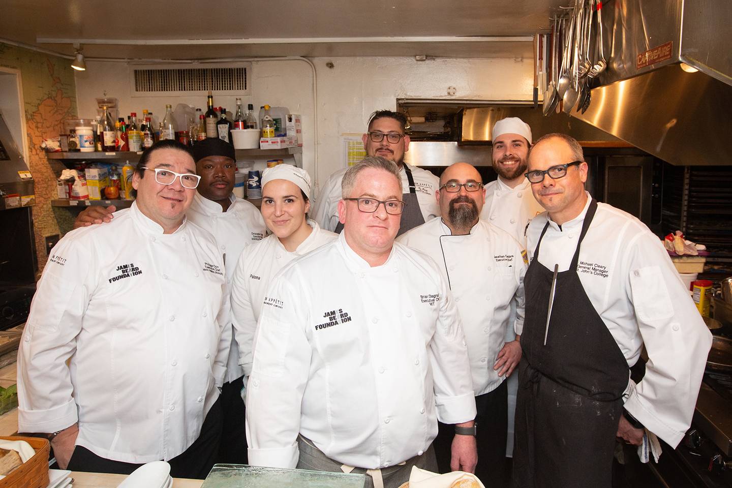 Chefs pose for a photo Chefs pose for a photo