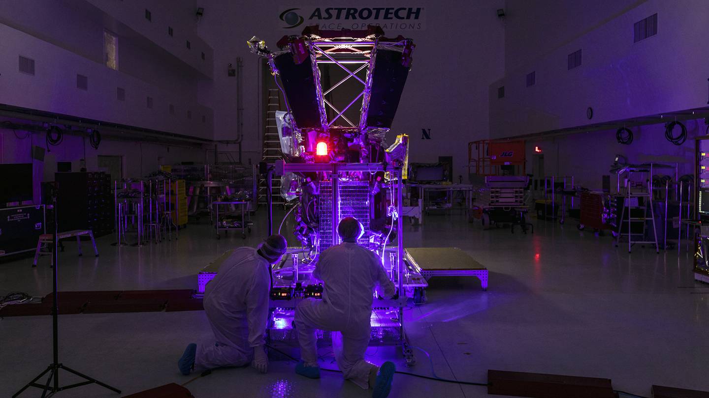 Scientists test the spacecraft with purple lasers