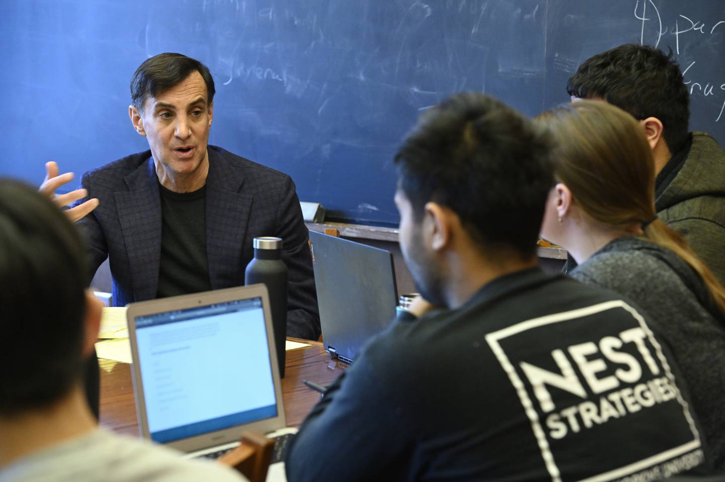 JHU President Ronald J. Daniels leads a student discussion 