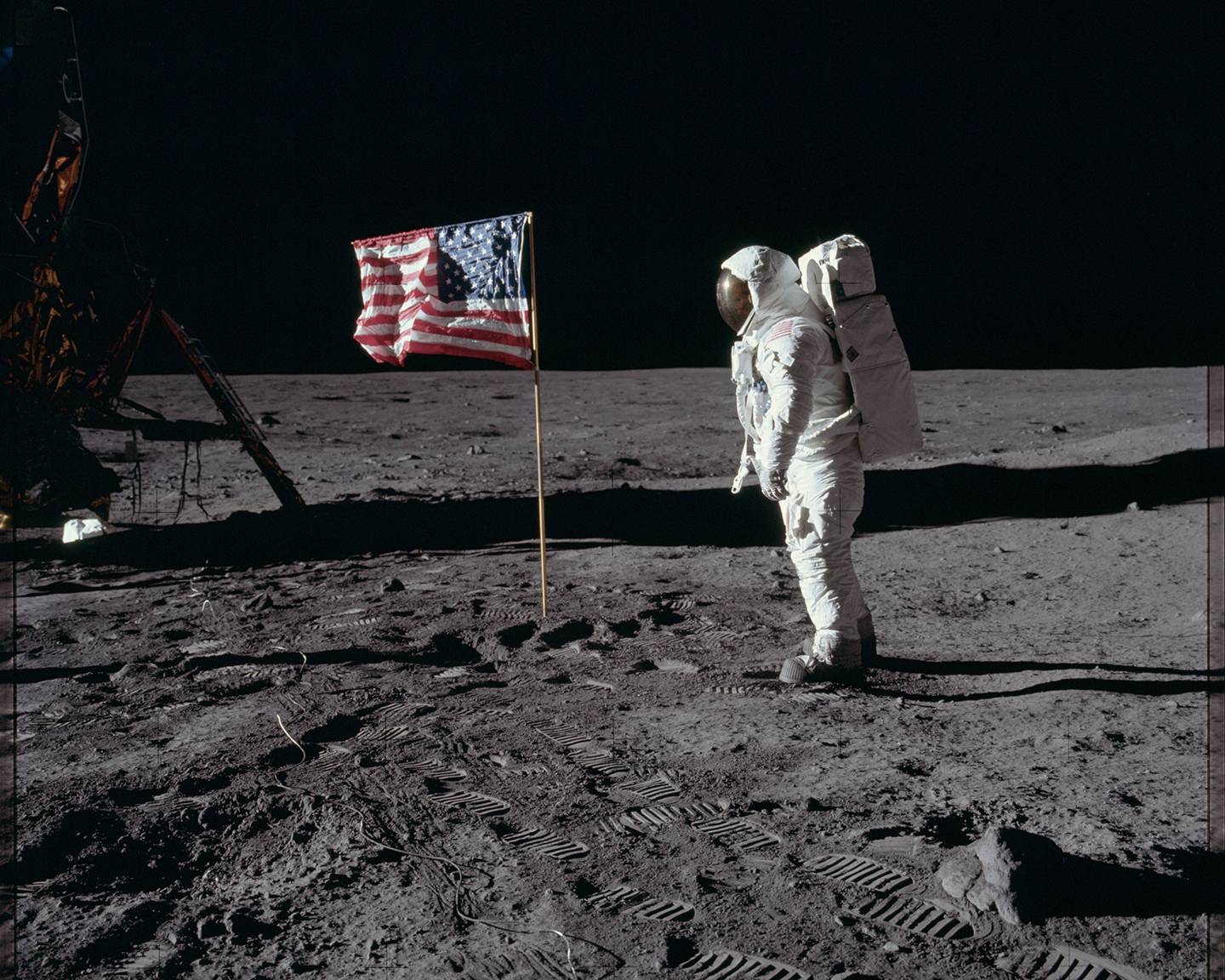 Buzz Aldrin salutes the American flag on the moon