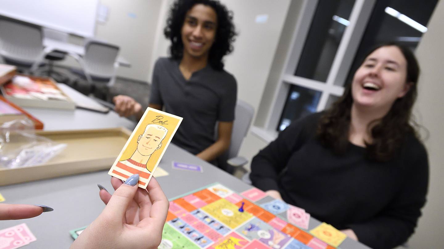 Students play a sexist board game