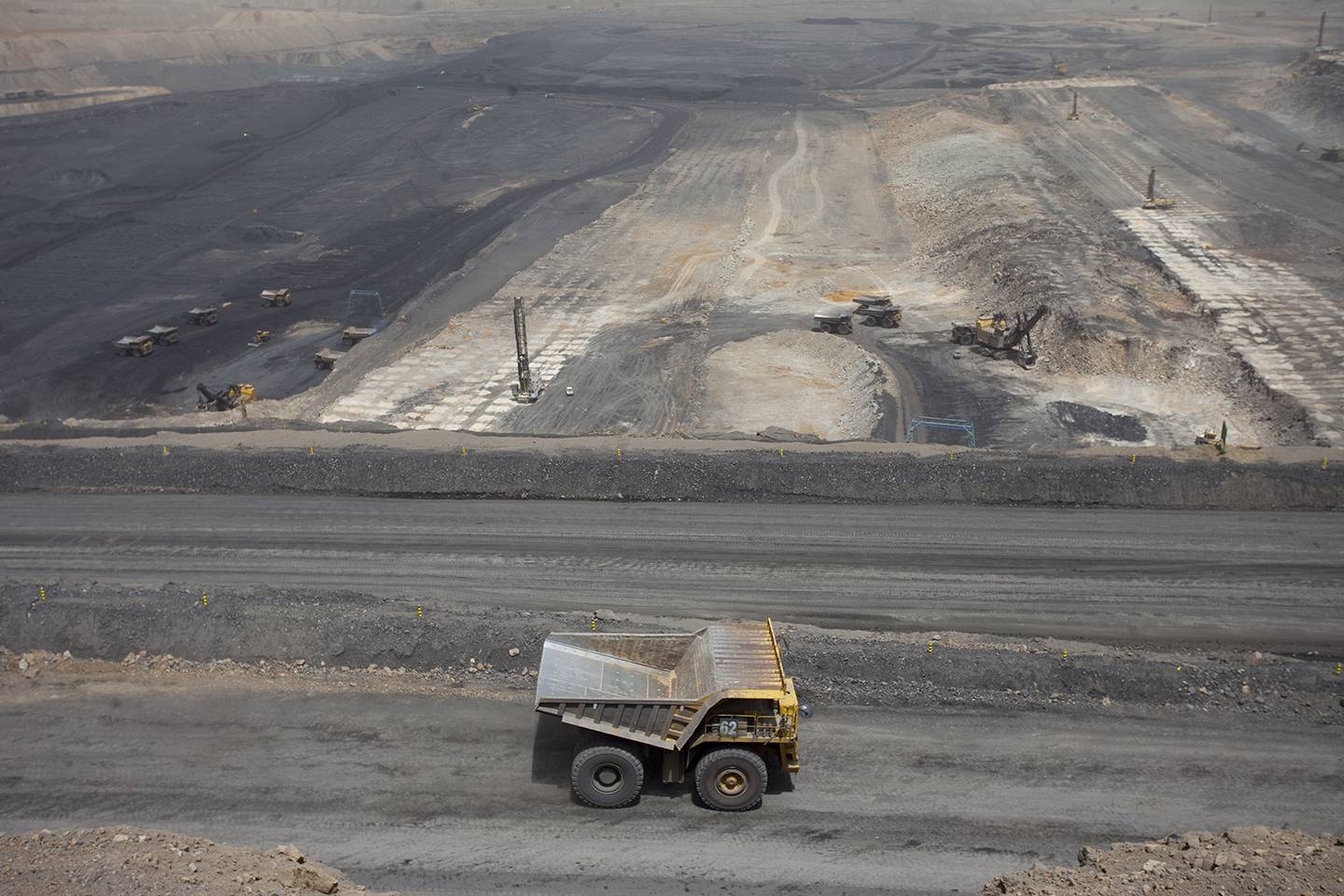 Dump truck driving at coal mine Dump truck driving at coal mine