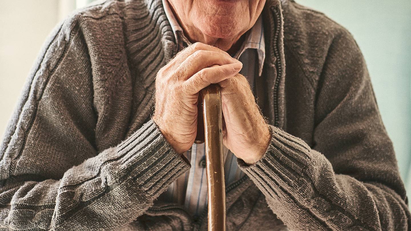 Elderly man with cane Elderly man with cane