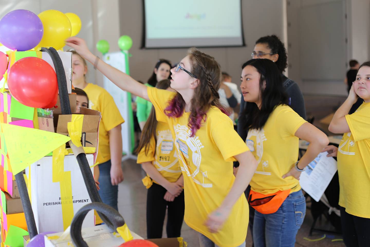 Girl scouts test a roller coaster