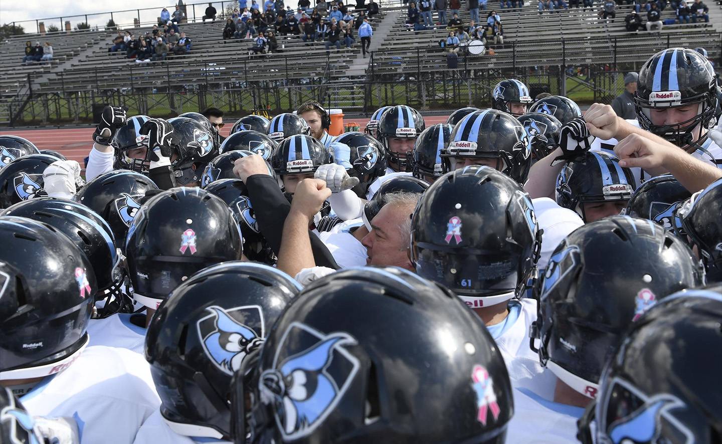 Coach Jim Margraff with the Hopkins football team