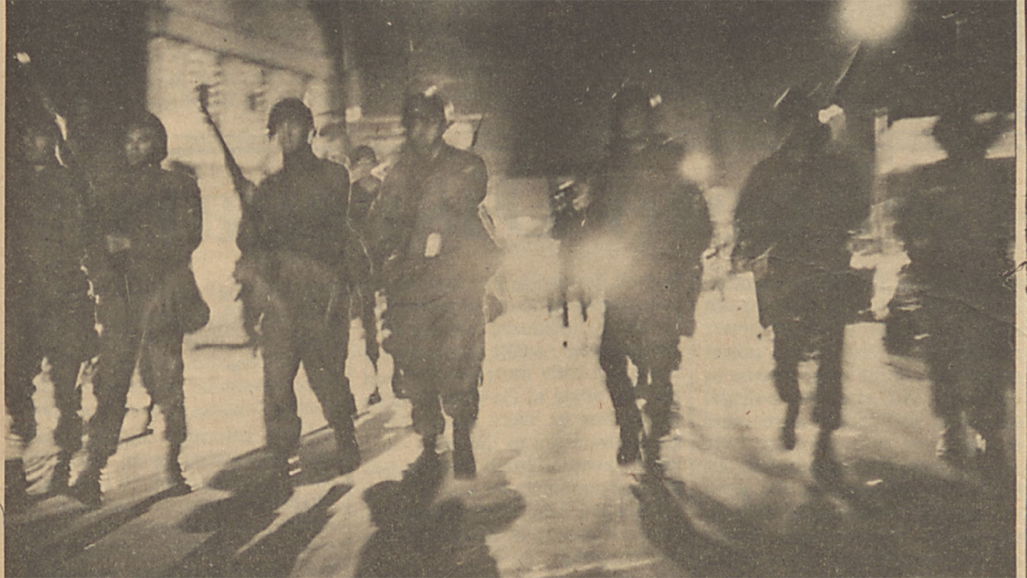 Yellowed newspaper clipping of riot police Yellowed newspaper clipping of riot police