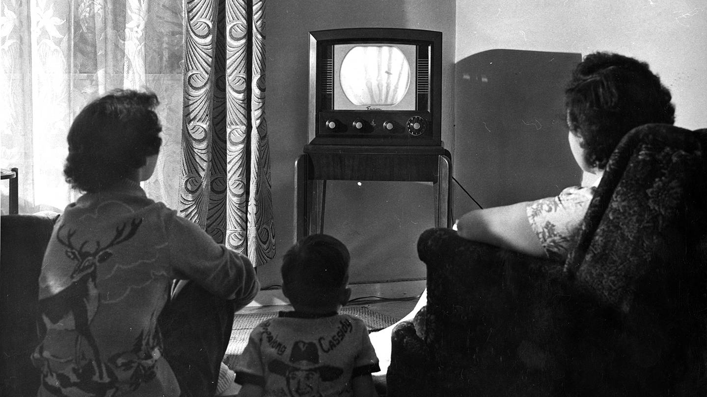 Family in front of tv Family in front of tv