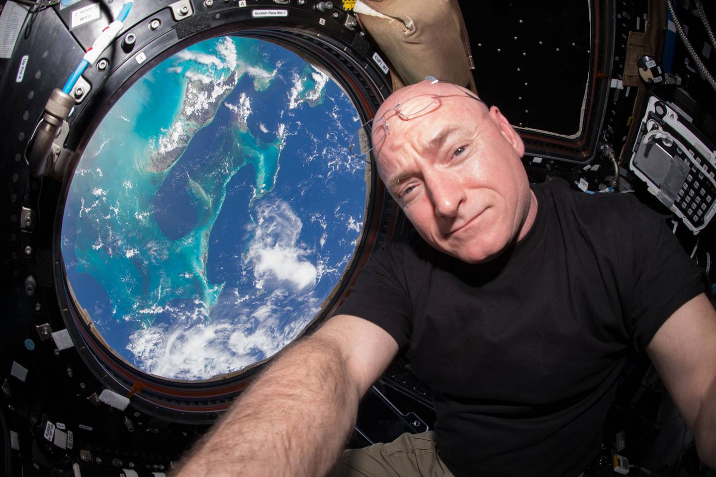 Scott Kelly looks out at Earth from the International Space Station