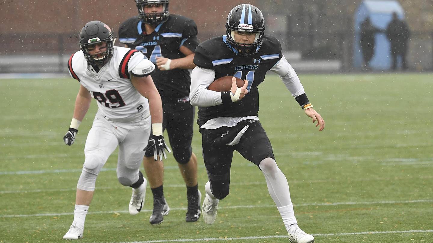 Johns Hopkins QB David Tammaro runs with the football Johns Hopkins QB David Tammaro runs with the football