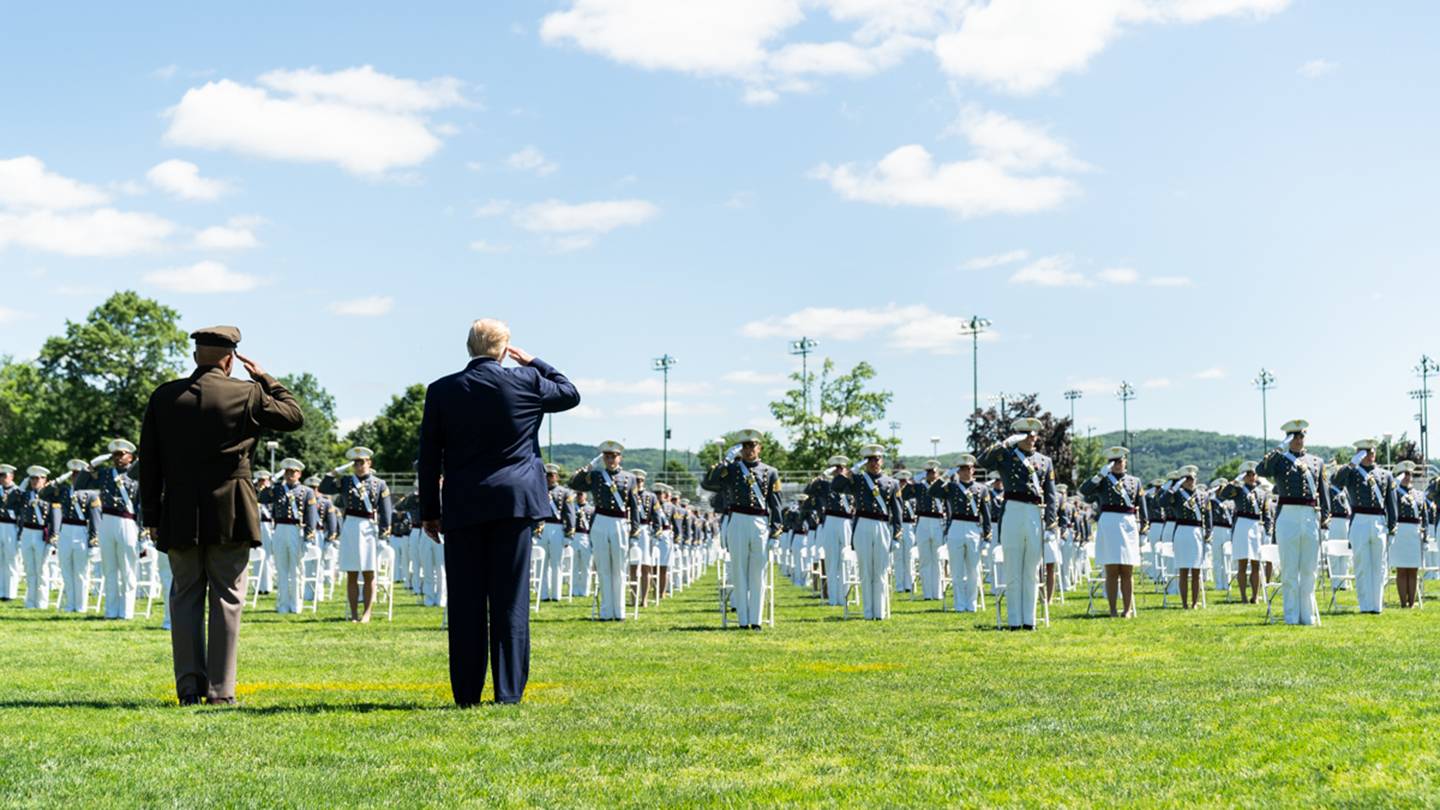 President Trump salutes West Point graduates, who salute him back