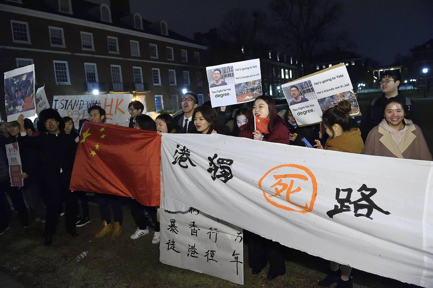 Protesters stand outside Shriver Hall 