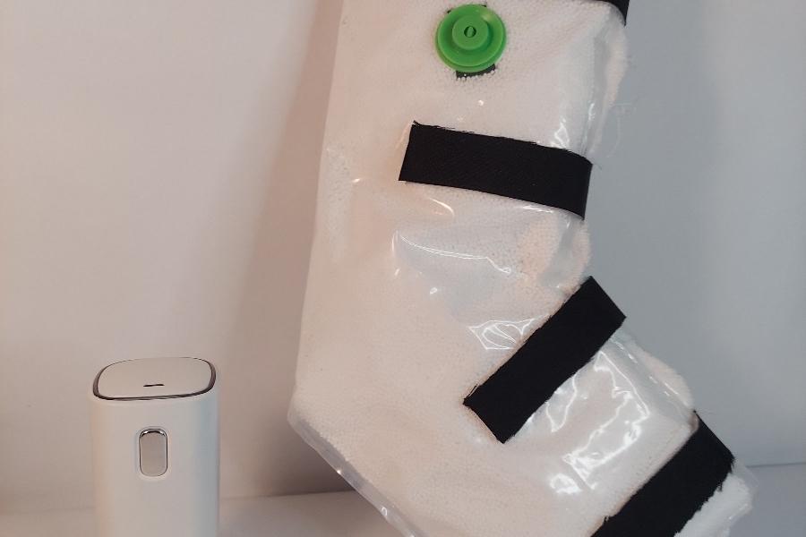 The Dynamic Brace and coordinating handheld pump.