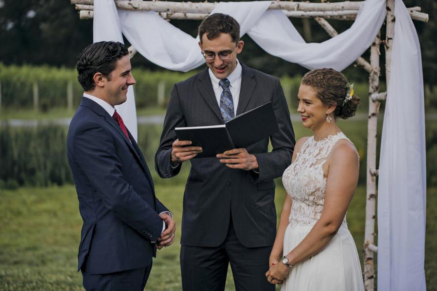 Adam Baumgartner, center, officiates at the 2019 wedding of Seán Bailey and Jenni Herchek.