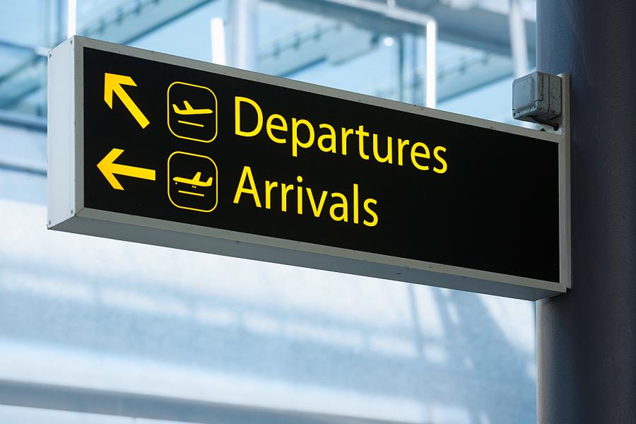 Departures and arrivals sign in an airport