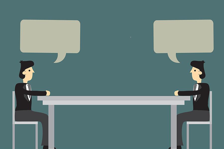 Illustration of two businessmen sitting at opposite ends of a long table