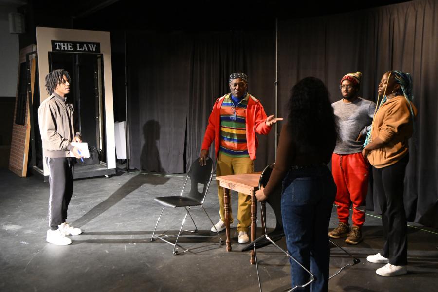 The cast rehearses the Dunbar Baldwin Hughes Theater Company production of 'Is God Is'