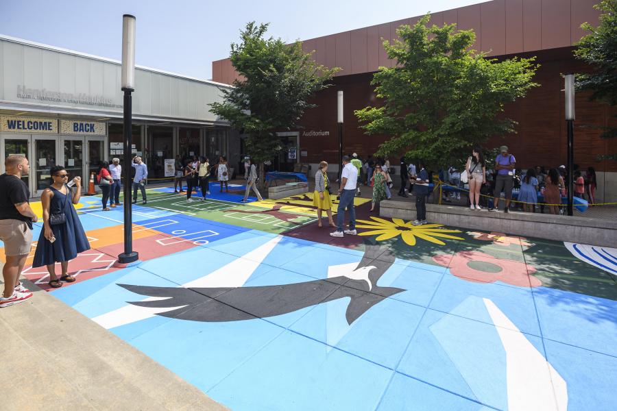 A colorful ground plane mural at Henderson-Hopkins