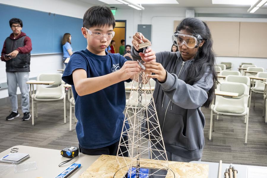 Middle schoolers build a tower during the Maryland Science Olympiad