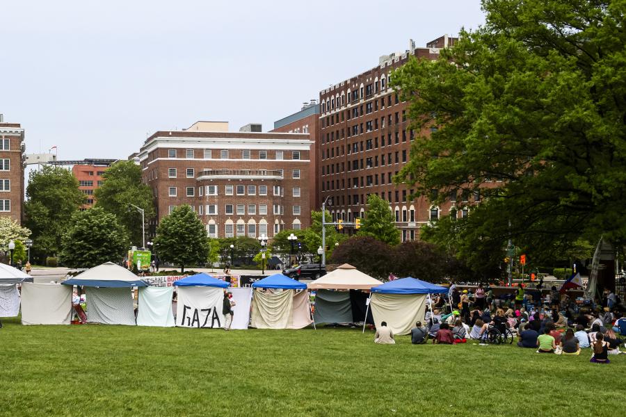 Pro-Palestinian protesters gather on the Beach at the university's Homewood campus April 30