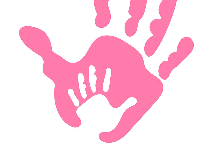 A child's handprint inside an adult handprint