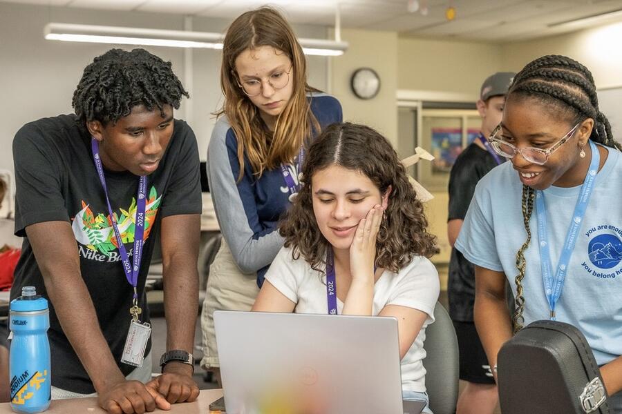 Dylan Robinson, left, and classmates work on glider plane designs during CTY's Principles of Engineering Design course at Dickinson College in Carlisle, Pennsylvania 