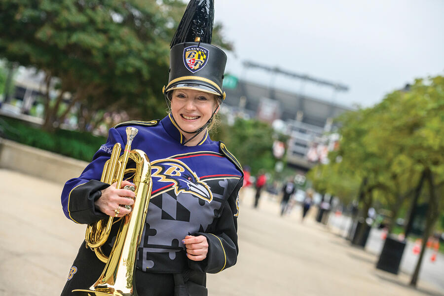 Gronvall dons her Marching Ravens uniform outside M&T Bank Stadium