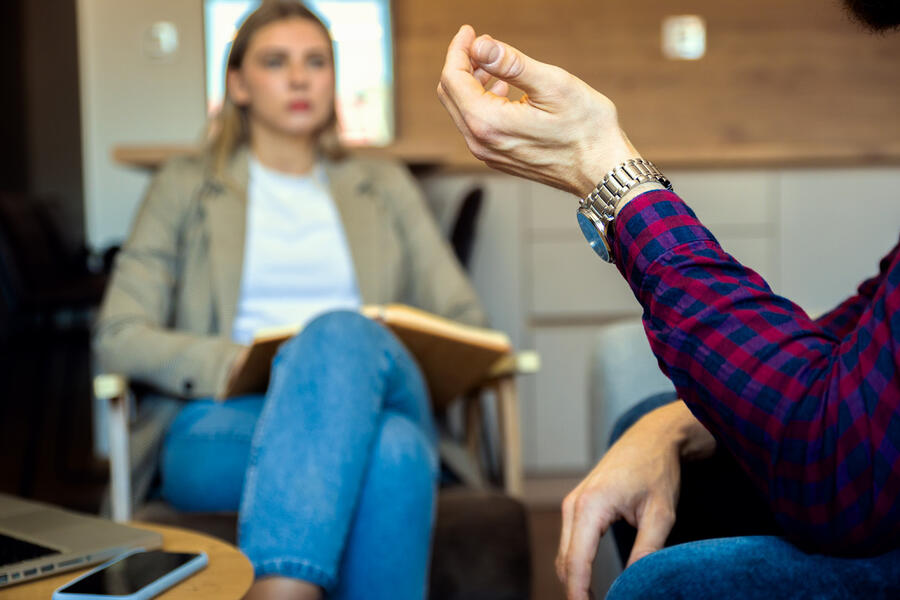 Man meeting one-on-one with a counselor