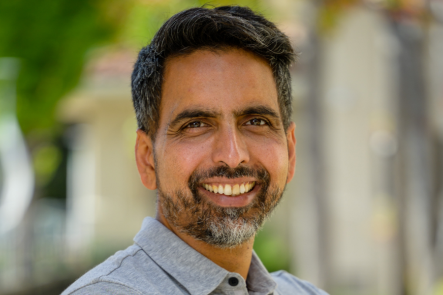 A professional headshot of Sal Khan.
