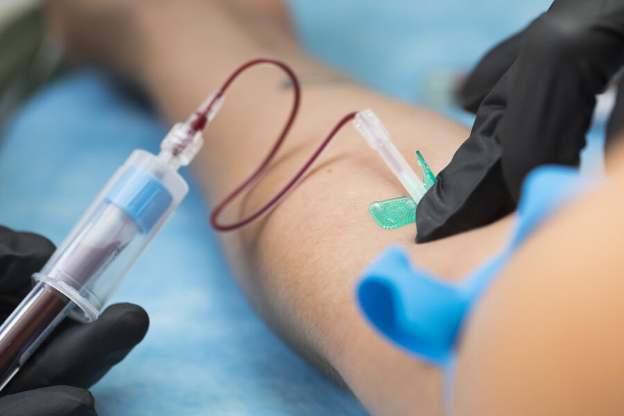 Nurse taking blood samples in hospital