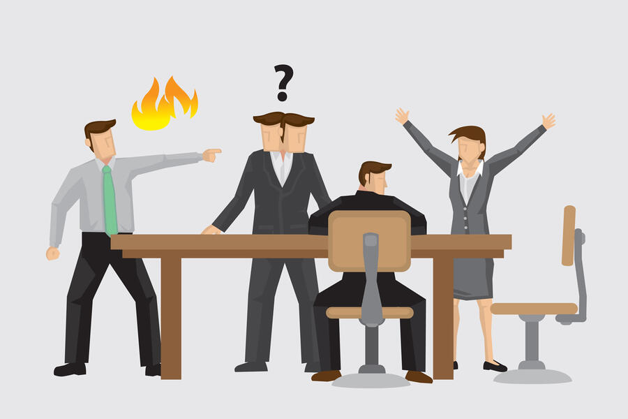 Co-workrs having a heated discussion around a table. Flames are coming out of one man's mouth.