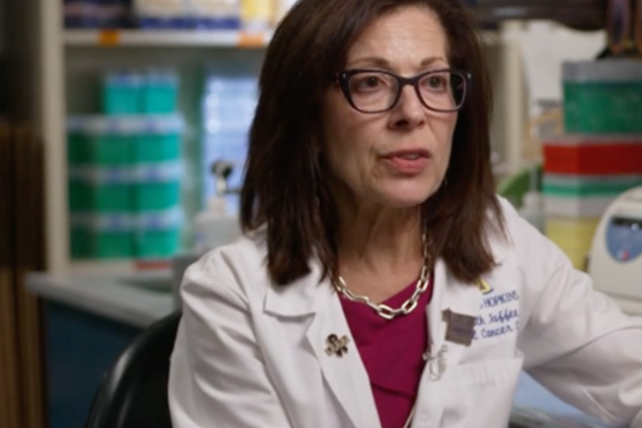 Liz Jaffee talks to Ted Koppel in this screenshot from a CBS News video clip