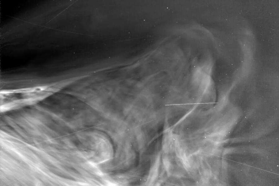 Black and white image of waves of solar wind