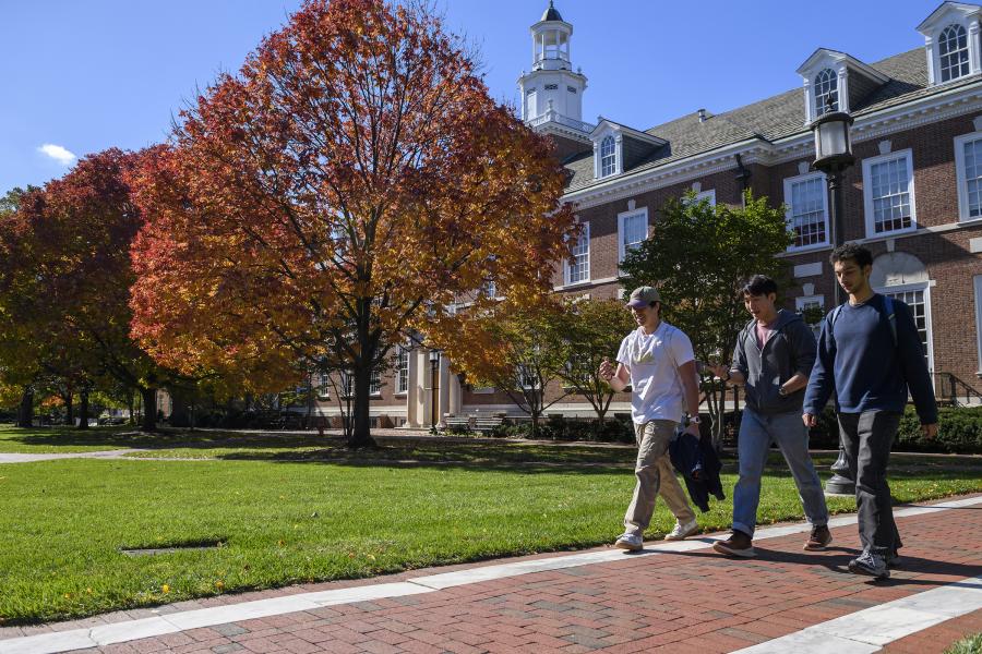 Students walking on the Homewood campus on a fall day