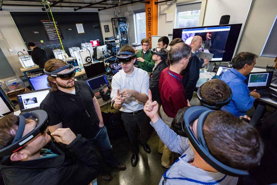 Group of people wearing VR goggles