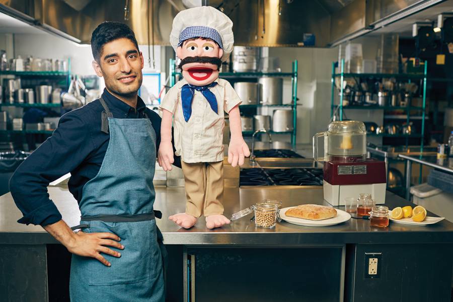 Mohammad Modarres with a puppet chef