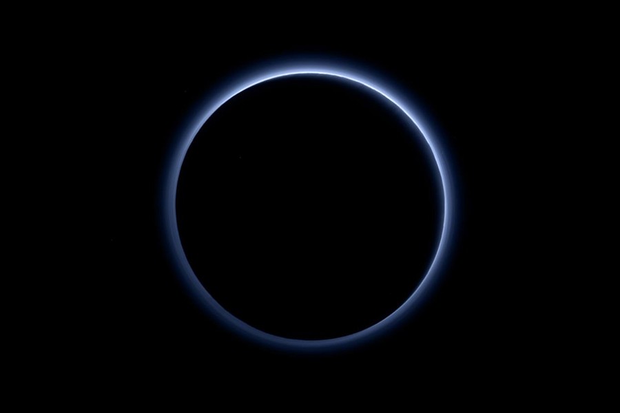 Blue haze surrounds Pluto