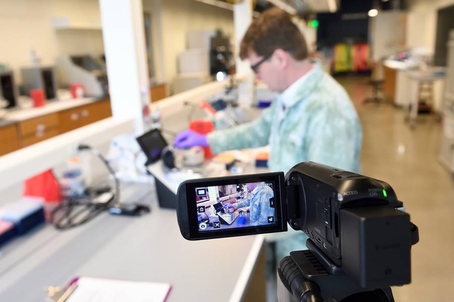 Eric Johnson prepares video content for his laboratory class