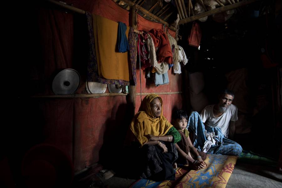 A Rohingya family in their home in the Kutupalong Rohingya Refugee Camp in Bangladesh