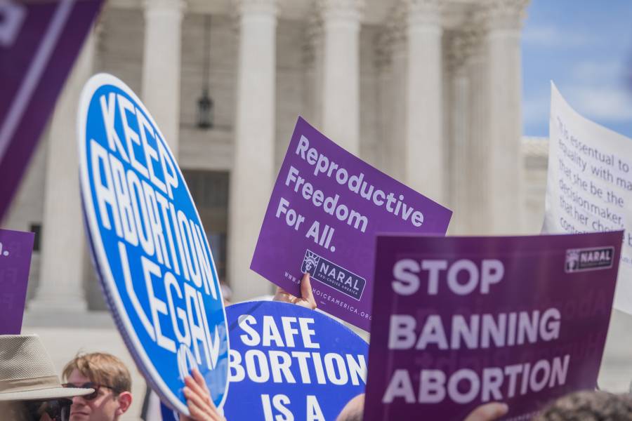 Pro choice protesters gather outside the Supreme Court