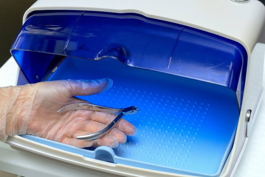 Manicure tools are disinfected using UV light