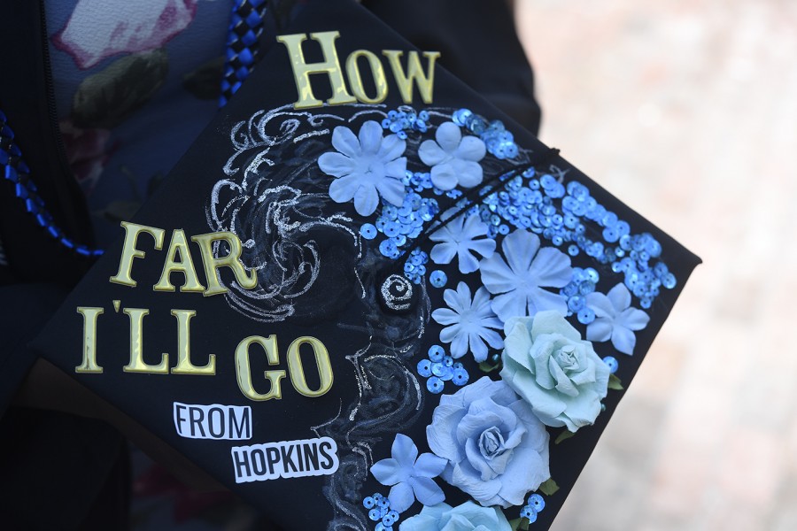 A decorated mortarboard with blue jewels