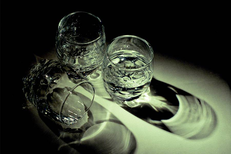 Three shot glasses on a table