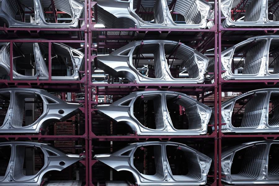 Steel car frames in an automotive manufacturing plant 
