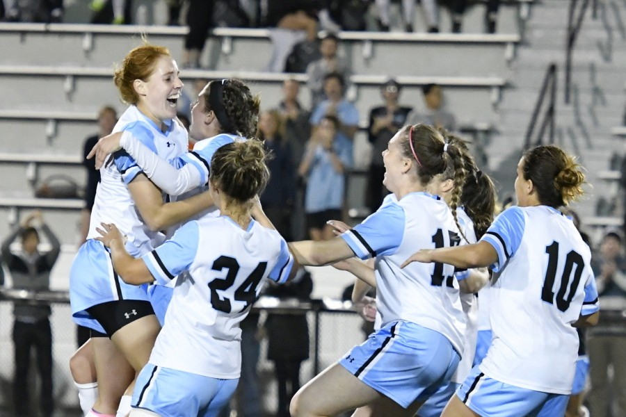 Hopkins women's soccer players celebrate