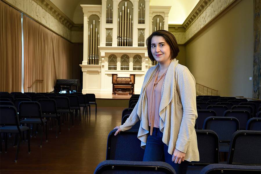 Chelsea Buyalos in the Peabody Conservatory’s Griswold Hall, which houses a custom-built Holtkamp organ.